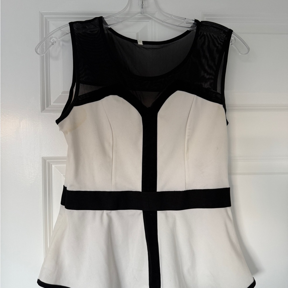 White and Black Peplum Sleeveless Blouse